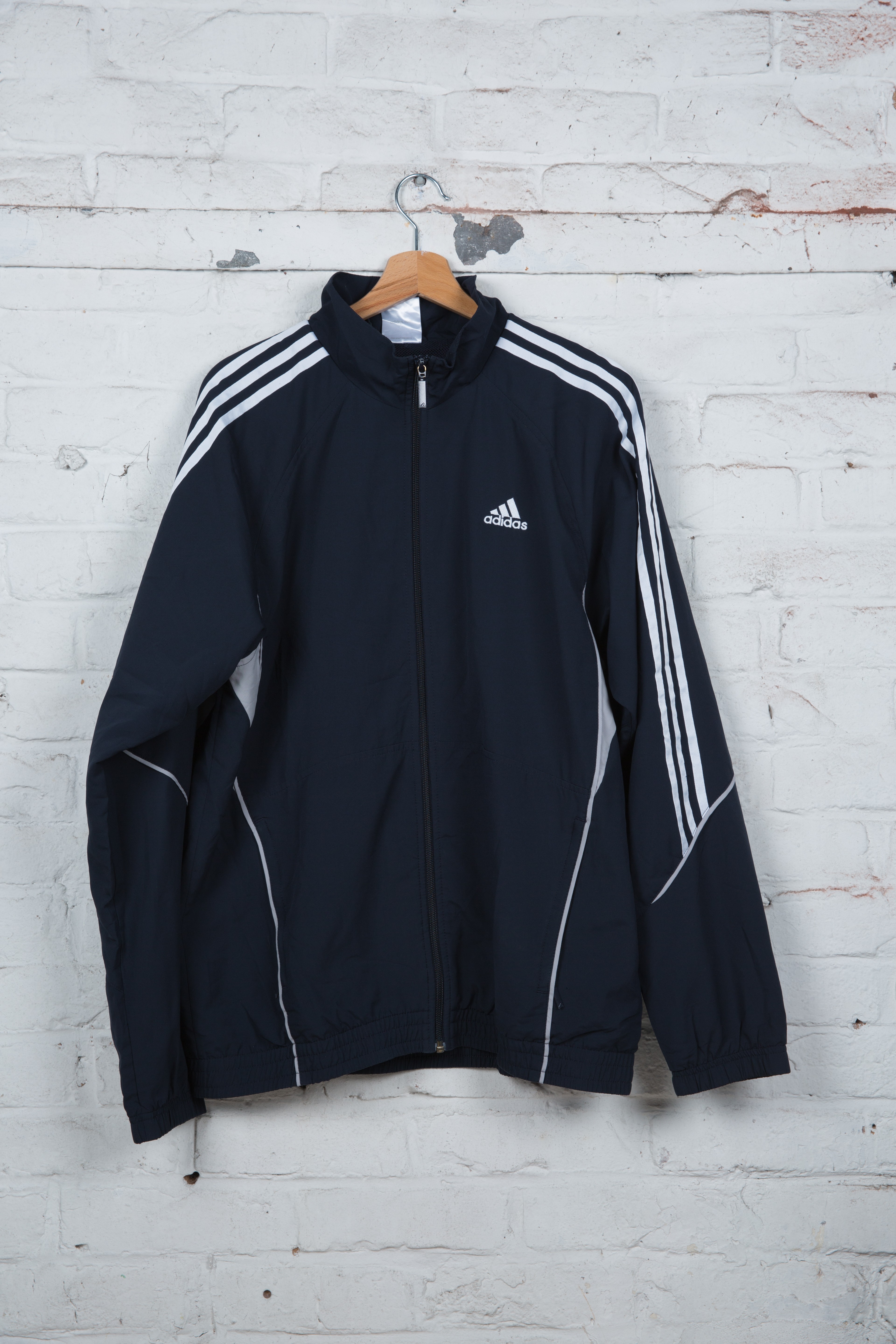 veste adidas bleu et blanche